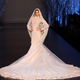 Illustration for article titled Batshit Dramatic Wedding Gowns From Paris Haute Couture Week